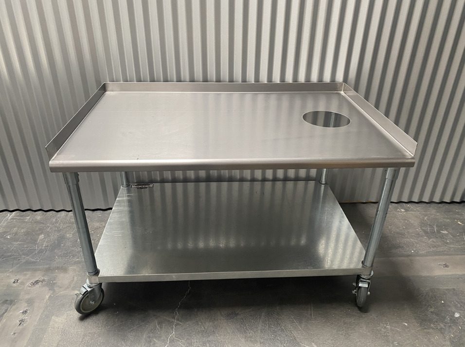 Stainless steel equipment stand on casters with a cut-out top and lower shelf